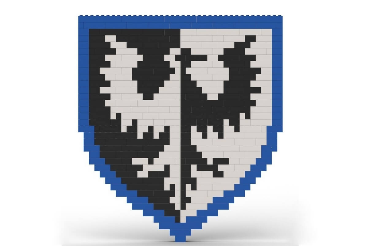 Das Wappen der Falkenritter aus Legosteinen in weiß, blau und schwarz.