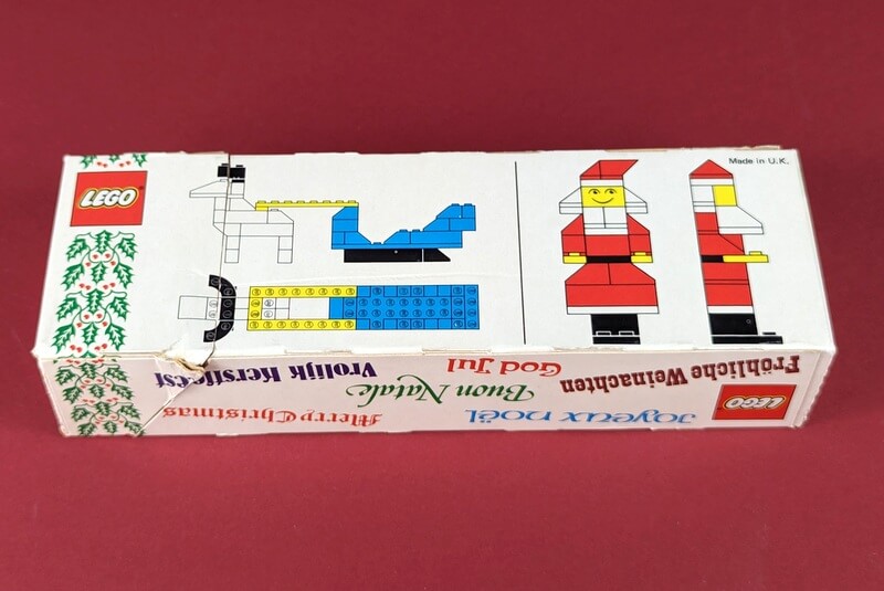 Auf der Rückseite des Kartons vpn LEGO-Set 246 ist die Bauanleitung abgedruckt. Man kann den Schlitten mit Rentier bauen und den Weihnachtsmann. 