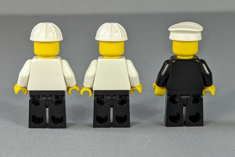 Minifiguren von Lego-Set 4030 von hinten.