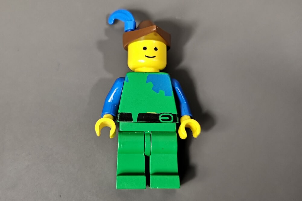 Fehldruck auf einer blau-grünen-Robin-Hood-Figur von Lego-